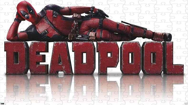 Deadpool lounges in iconic, sarcastic style on a bold red background