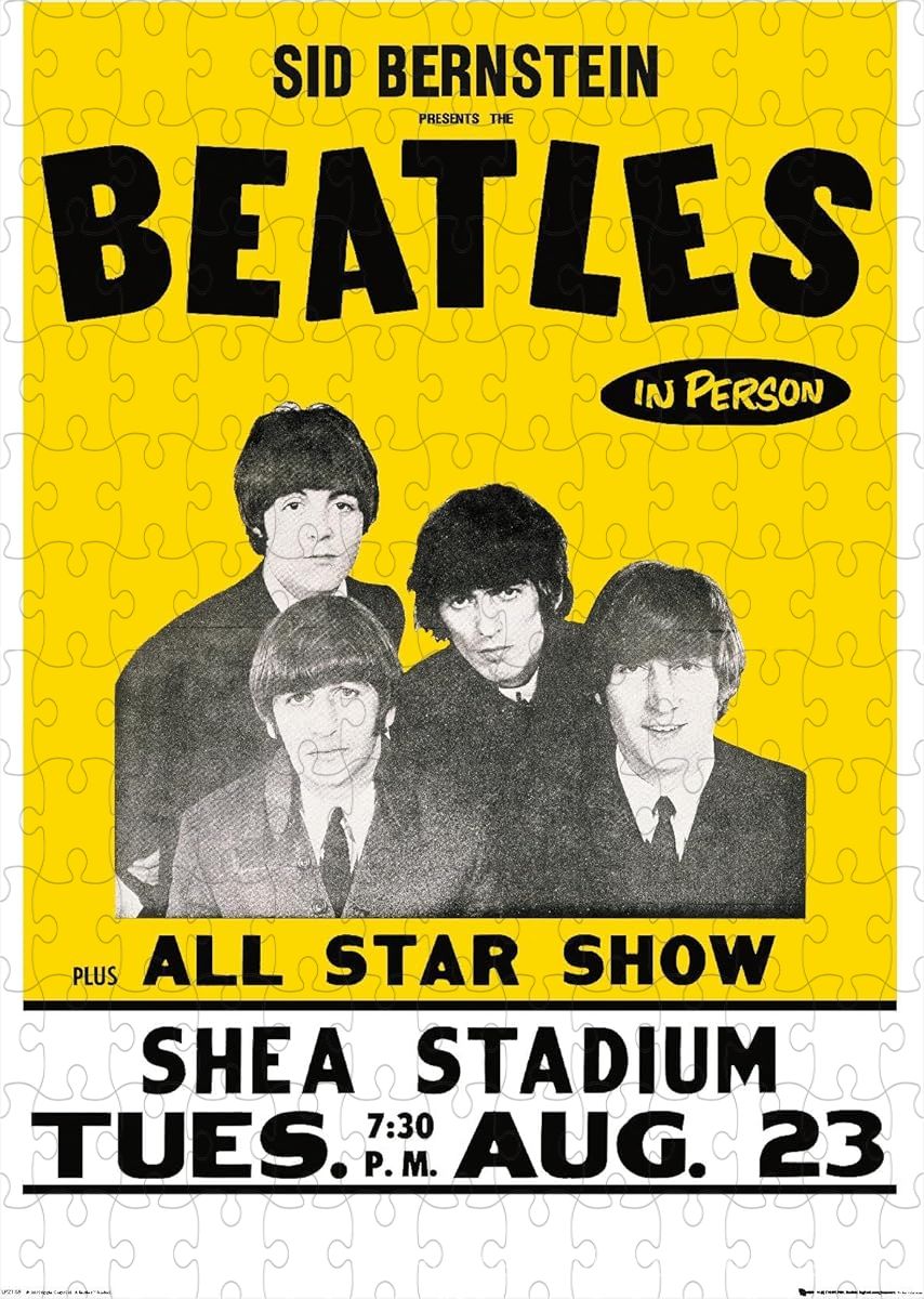A legendary photo of The Beatles performing at Shea Stadium, one of rock's biggest moments